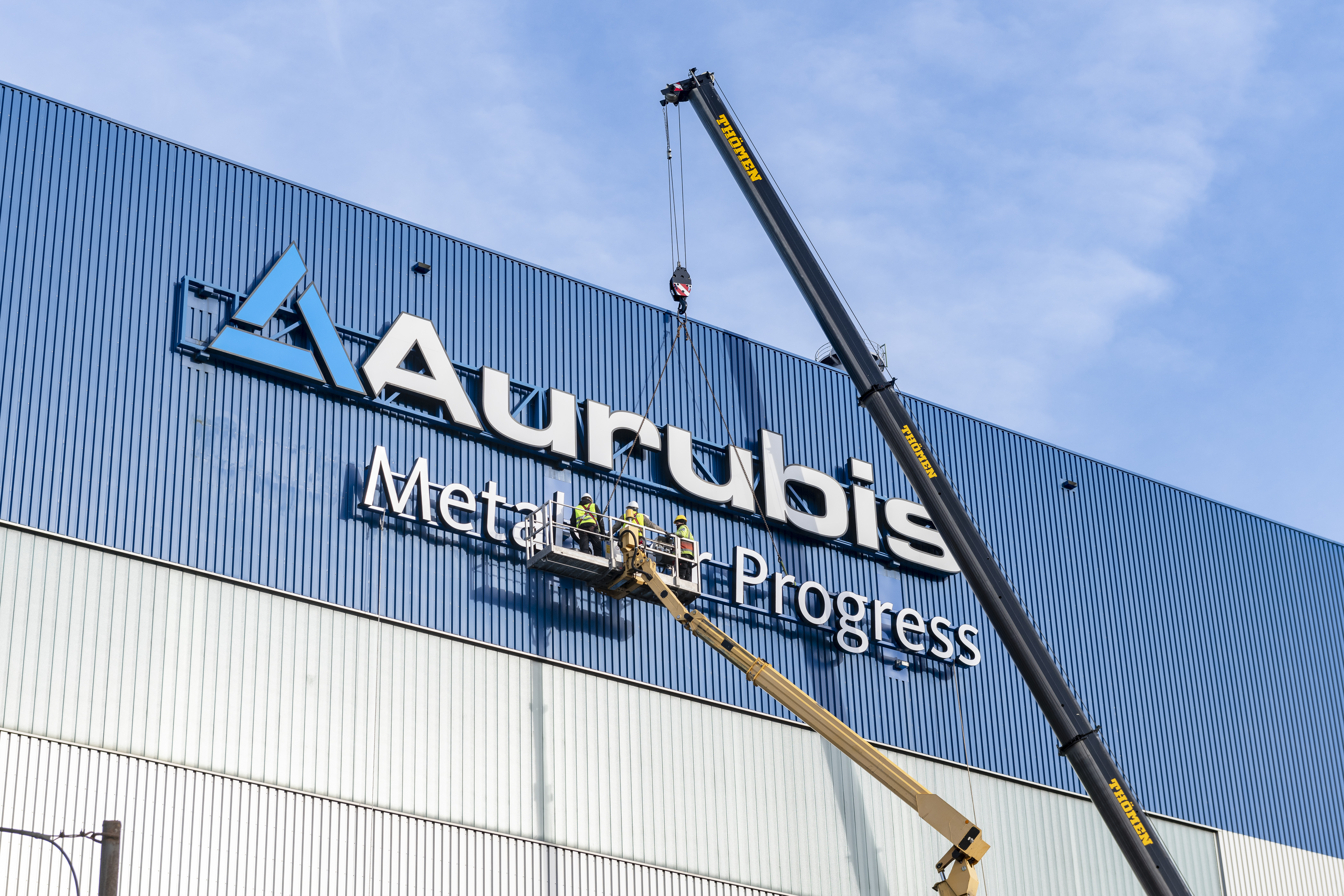The Aurubis logo over the years